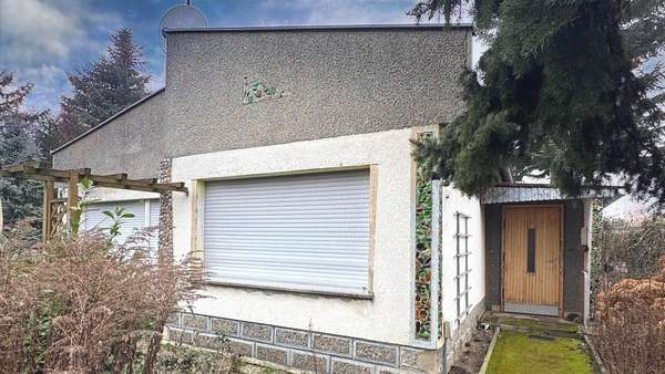 Seitenansicht, Eingang - Einfamilienhaus in 03185 Peitz mit 64m² kaufen