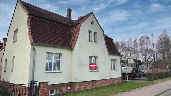 Straßenansicht 1 - Einfamilienhaus in 03185 Turnow-Preilack mit 144m² kaufen