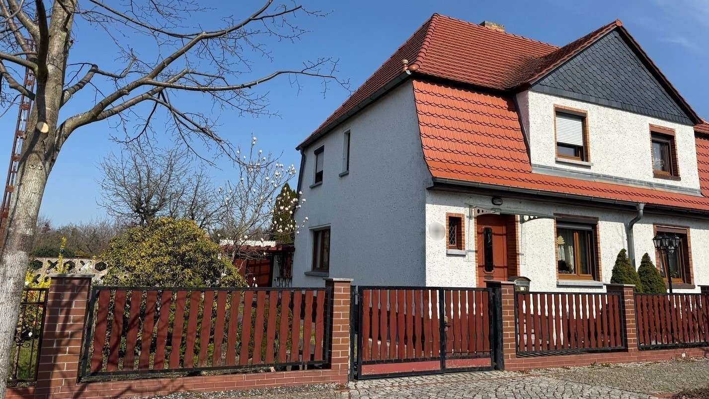 Straßenansicht Straßenansicht - Doppelhaushälfte in 03119 Welzow mit 81m² kaufen