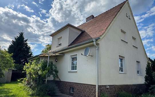 seitl. Straßenansicht seitl. Straßenansicht - Einfamilienhaus in 03149 Forst mit 94m² kaufen