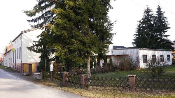 Gesamtansicht - Mehrfamilienhaus in 03149 Groß Schacksdorf-Simmersdorf mit 120m² kaufen