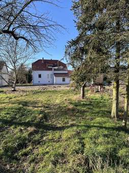 Blick vom Garten zum Haus Blick vom Garten zum Haus - Einfamilienhaus in 15926 Heideblick mit 180m² kaufen