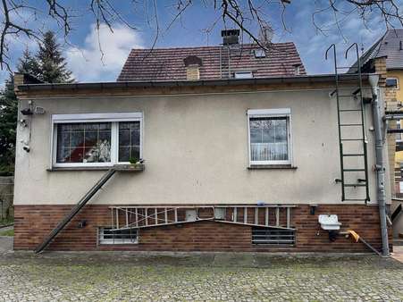 Hausrückansicht Hausrückansicht - Einfamilienhaus in 03238 Finsterwalde mit 110m² kaufen