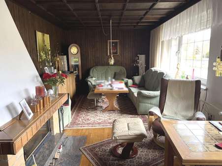 Wohnzimmer mit Kamin Wohnzimmer mit Kamin - Einfamilienhaus in 03238 Finsterwalde mit 110m² kaufen