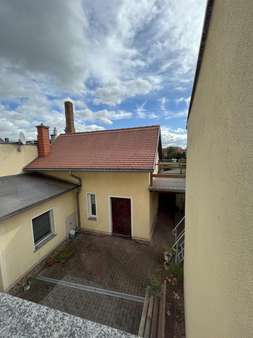 Blick vom Wohnhaus auf das NG - Einfamilienhaus in 04931 Mühlberg mit 110m² kaufen