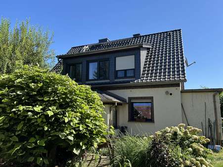 Rückseite des Wohnhauses - Einfamilienhaus in 03205 Calau mit 127m² kaufen