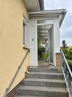 Eingang mit Wintergarten Eingang mit Wintergarten - Bungalow in 03222 Lübbenau mit 100m² kaufen