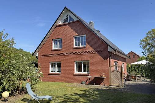 Seitenansicht - Einfamilienhaus in 21423 Winsen mit 156m² kaufen
