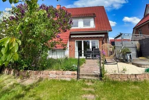 Rückseite - Doppelhaushälfte in 21279 Hollenstedt mit 109m² kaufen