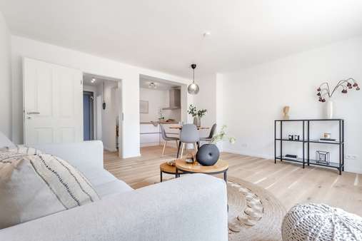 Blick ins Wohnzimmer mit Kochbereich - Reihenmittelhaus in 21614 Buxtehude mit 102m² günstig kaufen