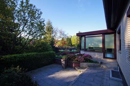 seitlicher Blick auf den Wintergarten - Einfamilienhaus in 21266 Jesteburg mit 125m² kaufen