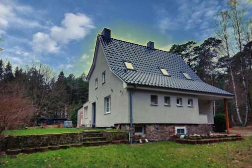 Gartenansicht - Einfamilienhaus in 21266 Jesteburg mit 148m² kaufen