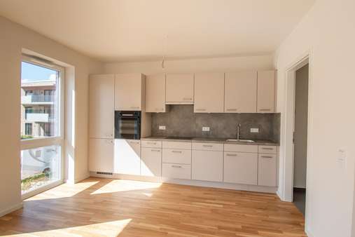 Wohn- und Esszimmer mit Küche - Penthouse-Wohnung in 24376 Kappeln mit 92m² kaufen