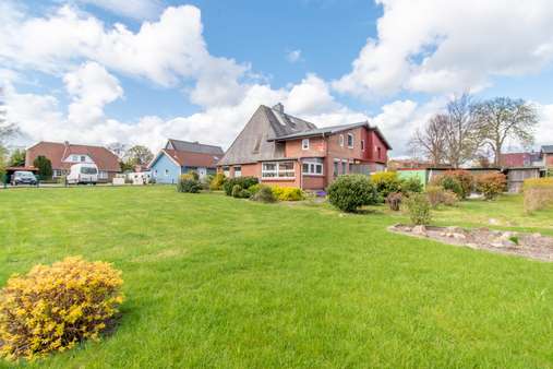 Gartenansicht - Einfamilienhaus in 24613 Aukrug mit 152m² kaufen