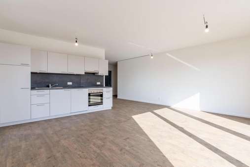 Wohn- und Esszimmer mit Küche - Penthouse-Wohnung in 24211 Preetz mit 110m² mieten