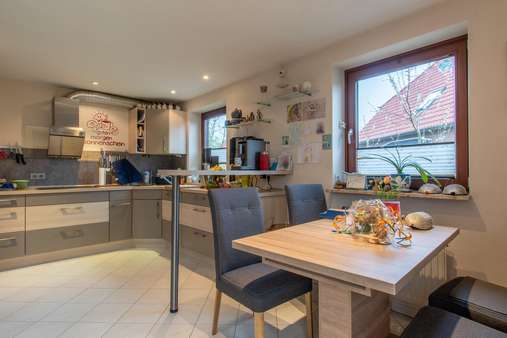 Wohn- und Esszimmer mit Küche - Einfamilienhaus in 24232 Schönkirchen mit 117m² kaufen