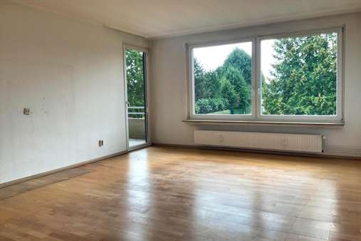 Wohnzimmer - Etagenwohnung in 24119 Kronshagen mit 85m² kaufen