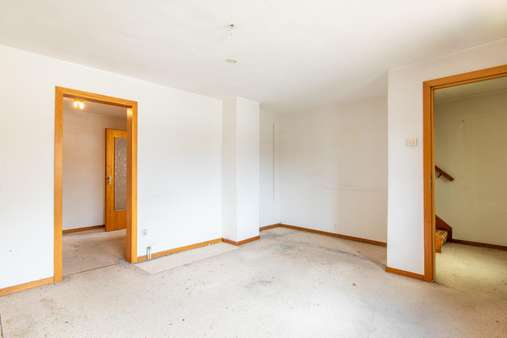 Wohnzimmer - Doppelhaushälfte in 24232 Schönkirchen mit 60m² kaufen