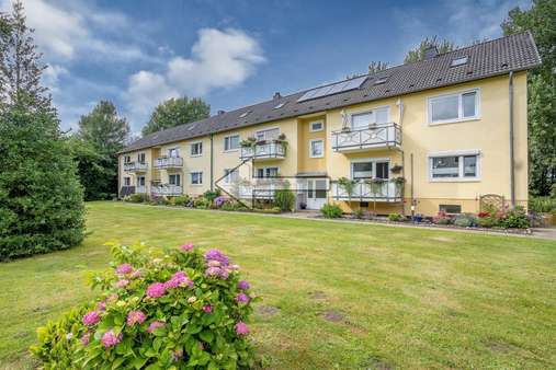 Außenansicht Außenansicht - Erdgeschosswohnung in 24214 Gettorf mit 64m² kaufen