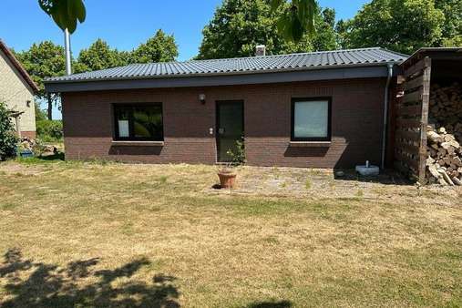 Garage mit Nebenräumen - Zweifamilienhaus in 23738 Manhagen mit 220m² kaufen