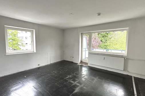 Wohnzimmer - Etagenwohnung in 21465 Reinbek mit 65m² kaufen