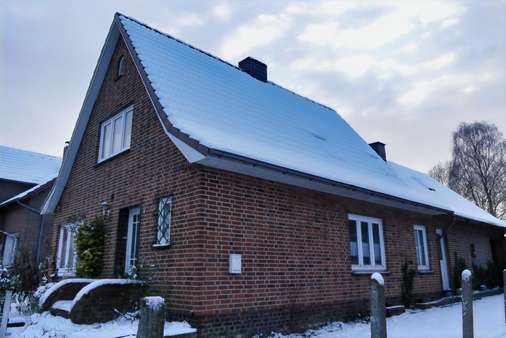 Seitenansicht - Einfamilienhaus in 25557 Hanerau-Hademarschen mit 106m² kaufen