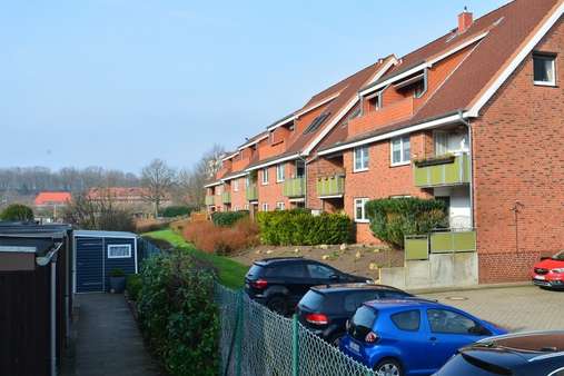 Seitliche Rückansicht - Etagenwohnung in 24768 Rendsburg mit 80m² kaufen