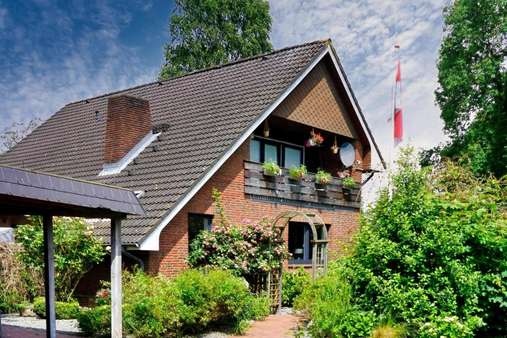 Außenansicht Außenansicht - Einfamilienhaus in 25746 Lohe-Rickelshof mit 159m² kaufen