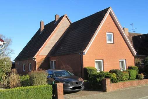 Blick von der Strasse - Einfamilienhaus in 24782 Büdelsdorf mit 100m² kaufen