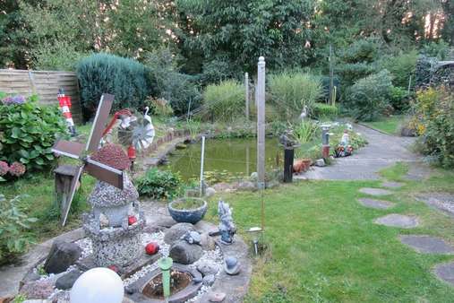 Blick in den Garten - Einfamilienhaus in 24784 Westerrönfeld mit 122m² kaufen