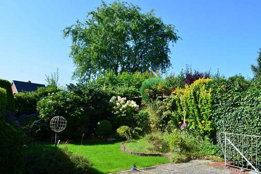 Blick in den Garten - Reihenmittelhaus in 24782 Büdelsdorf mit 115m² kaufen