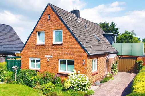 Gesamtansicht - Einfamilienhaus in 24782 Büdelsdorf mit 161m² kaufen