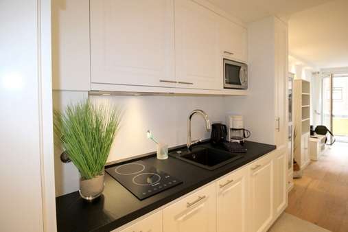Küche mit Einbauküche - Etagenwohnung in 25980 Sylt mit 54m² kaufen