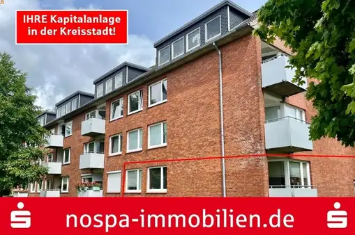 GUT vermietete Hochparterre Eigentumswohnung  mit  Balkon und PKW Stellplatz im Herzen von Husum