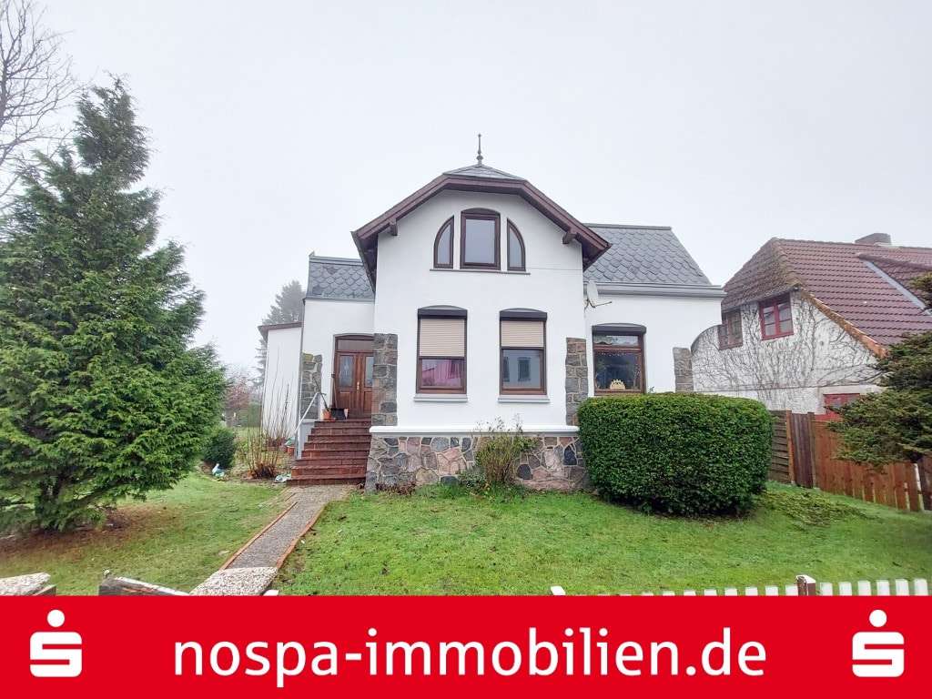 Titelbild - Zweifamilienhaus in 24392 Süderbrarup mit 168m² günstig kaufen