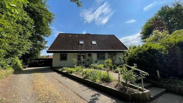 Straßenansicht - Einfamilienhaus in 24988 Oeversee mit 167m² kaufen