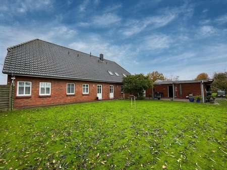 Gartenansicht - Zweifamilienhaus in 25885 Immenstedt mit 248m² kaufen