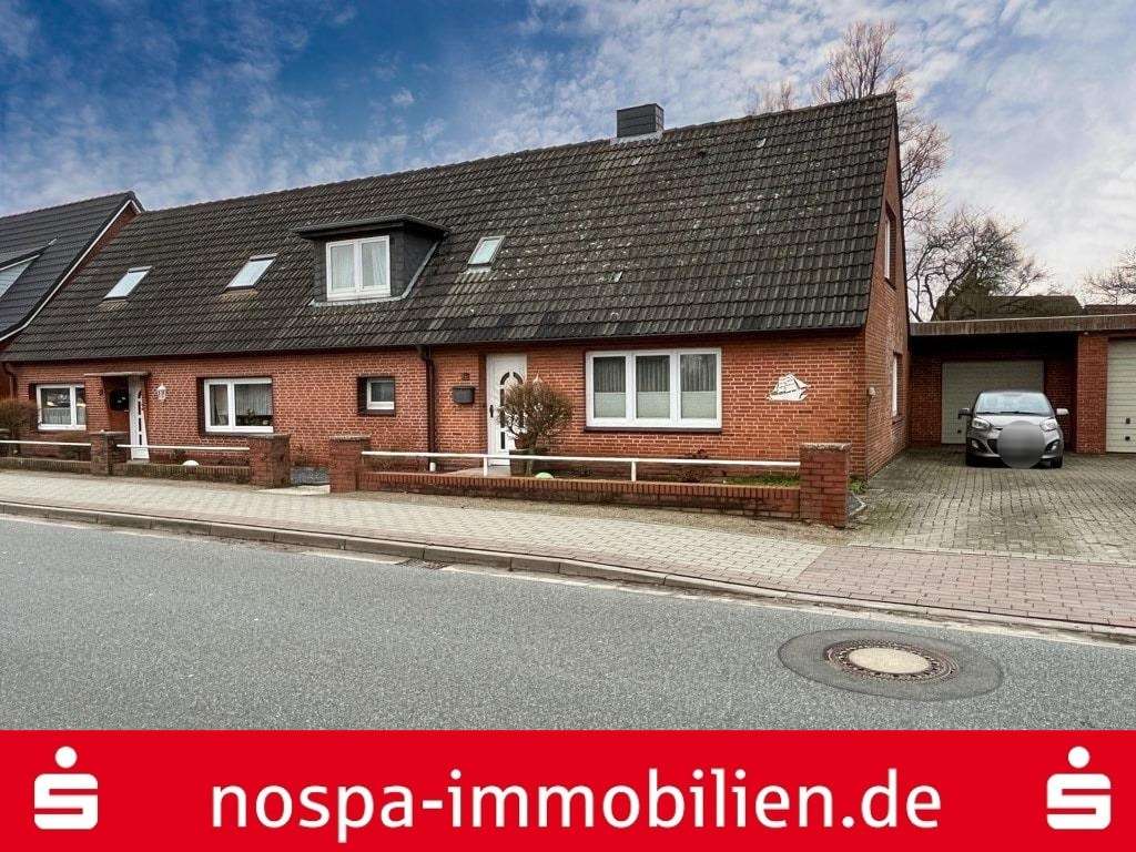 Straßenansicht - Zweifamilienhaus in 25872 Ostenfeld mit 180m² kaufen