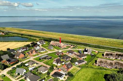 Luftbild - Reihenmittelhaus in 25845 Nordstrand mit 74m² kaufen