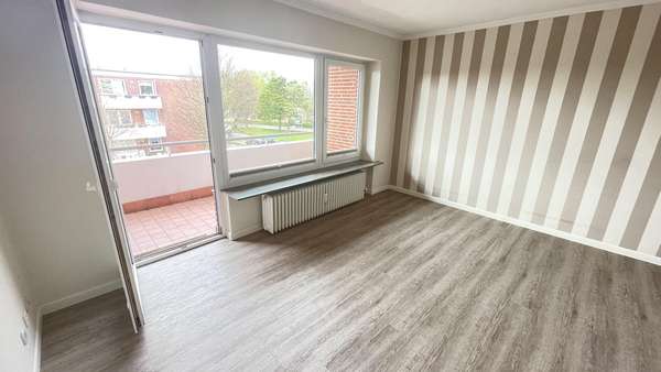 Wohnzimmer - Etagenwohnung in 25938 Wyk mit 41m² kaufen