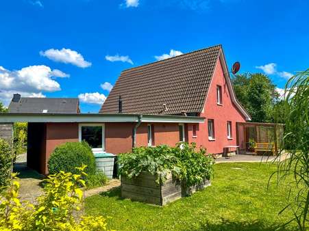 Außen - Einfamilienhaus in 25746 Heide mit 100m² kaufen