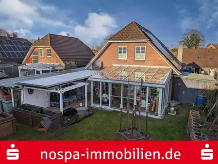 Einfamilienhaus in Schleswig - Ebenerdig bewohnbar mit Wintergarten 
und Photovoltaikanlage