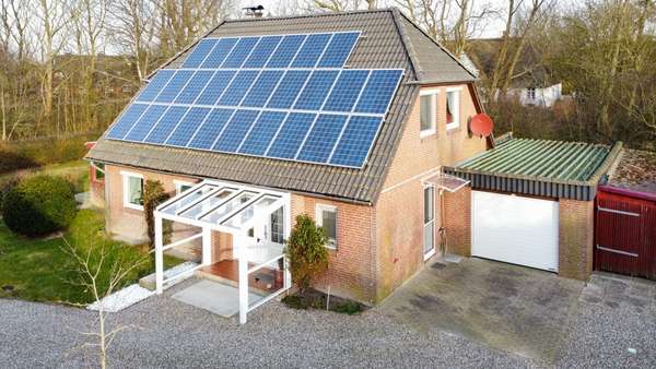 Gartenansicht - Einfamilienhaus in 25889 Uelvesbüll mit 138m² kaufen