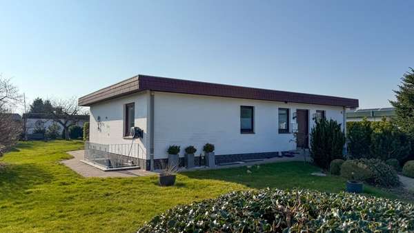 Straßenansicht - Einfamilienhaus in 24955 Harrislee mit 100m² kaufen