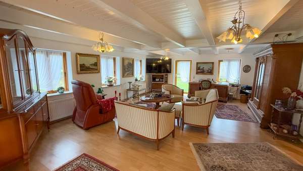 Wohnzimmer Haupthaus - Einfamilienhaus in 24994 Osterby mit 247m² kaufen