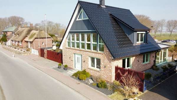 Straßenansicht - Einfamilienhaus in 25845 Nordstrand mit 149m² kaufen