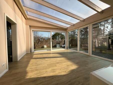 Überdachte und geschlossene Terrasse - Einfamilienhaus in 25845 Nordstrand mit 149m² kaufen