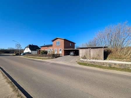 Straßenansicht - Zweifamilienhaus in 24972 Steinbergkirche mit 156m² kaufen