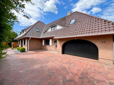 Straßenansicht - Einfamilienhaus in 25866 Mildstedt mit 267m² kaufen