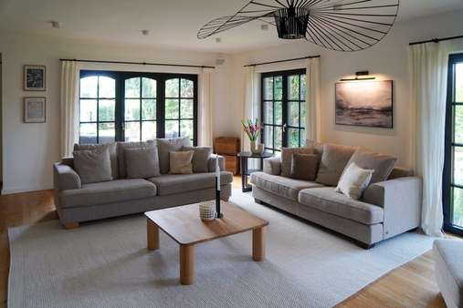Wohnzimmer - Einfamilienhaus in 25866 Mildstedt mit 267m² kaufen
